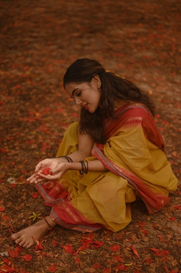 Saffron Yellow Saree with Red and Golden Lined Border