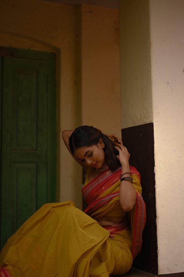 Saffron Yellow Saree with Red and Golden Lined Border